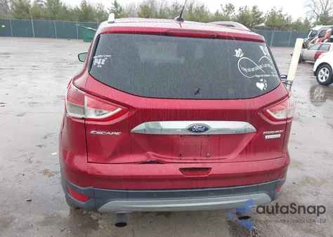 2014 Ford Escape Titanium z USA, uszkodzony, nr VIN 1FMCU0J96EUD93271